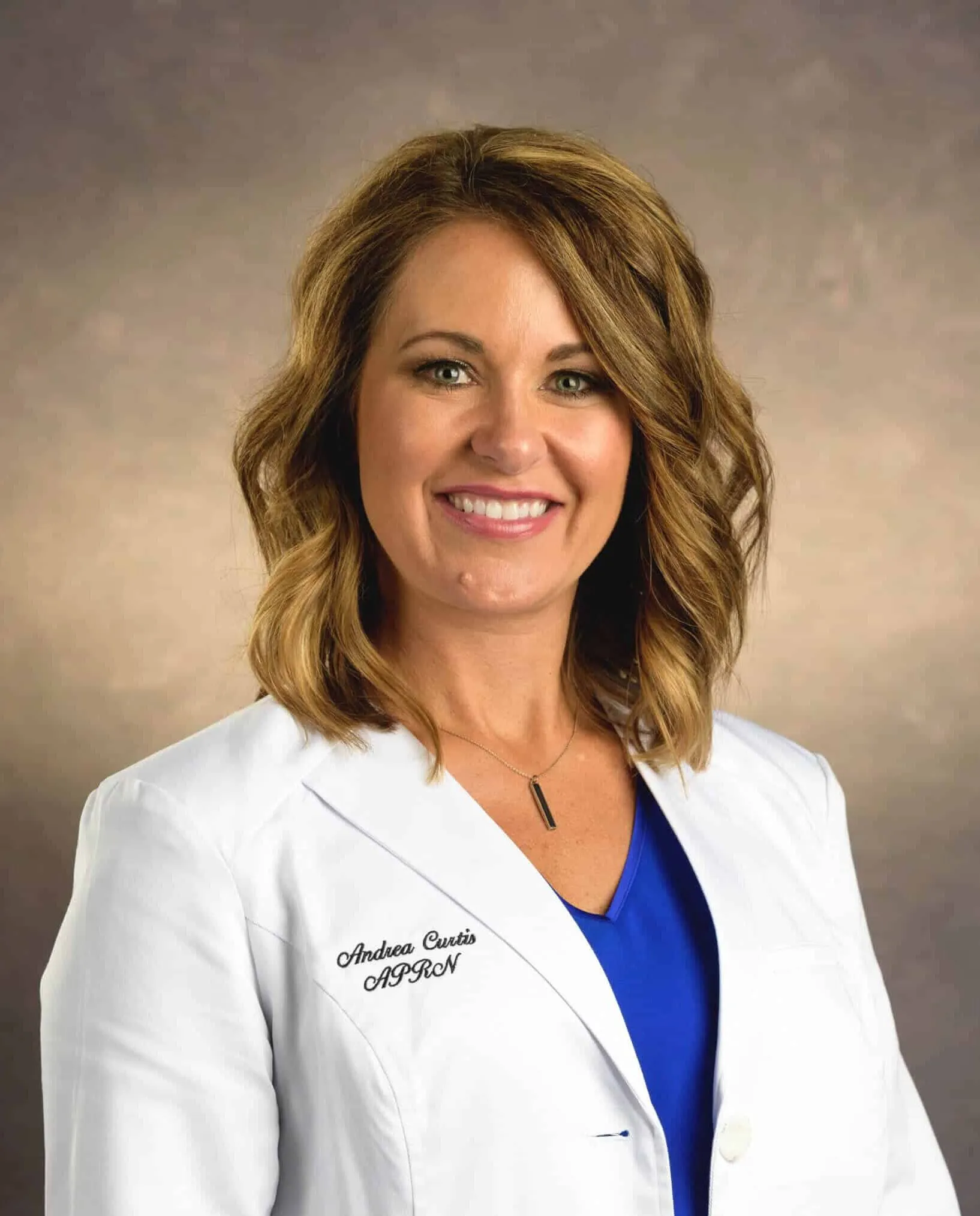 Andrea Curtis, Medical Director at Essence Med Spa in Grand Island and Hastings, Nebraska, expert in aesthetic medicine and skincare treatments