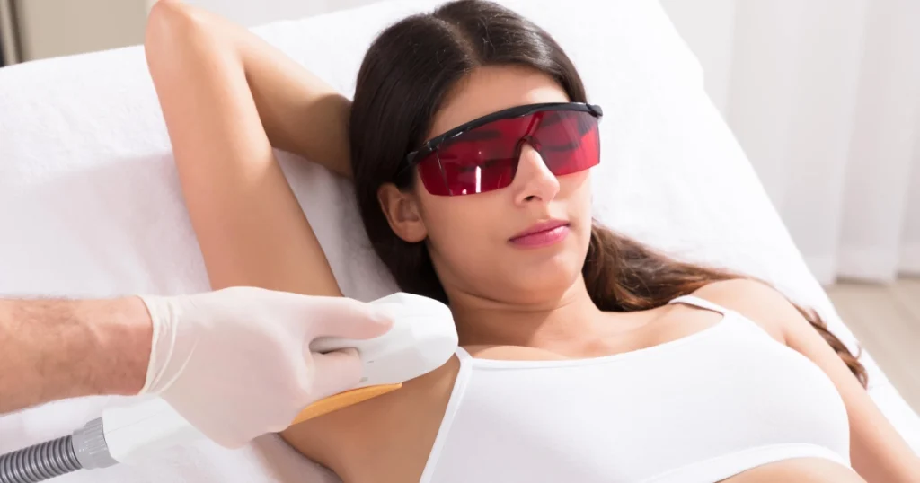 Woman receiving armpit Laser Hair Removal at a clinic in Hastings, NE