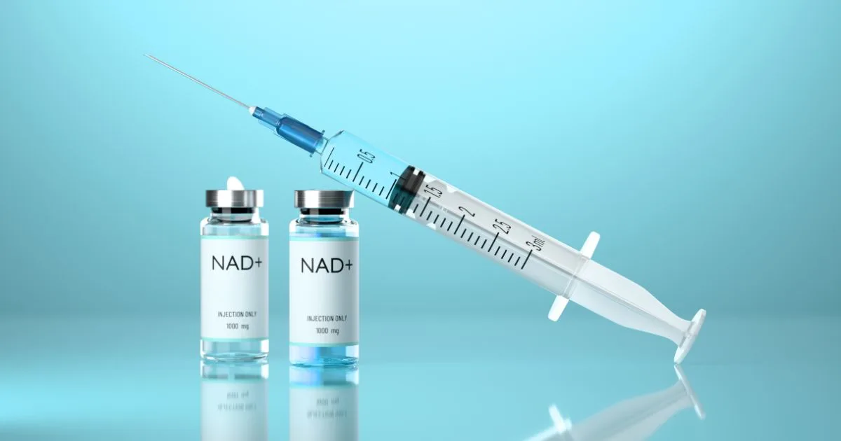 Syringe and vials labeled NAD+ Injection 1000 mg, representing the advanced NAD+ therapy and delivery method.