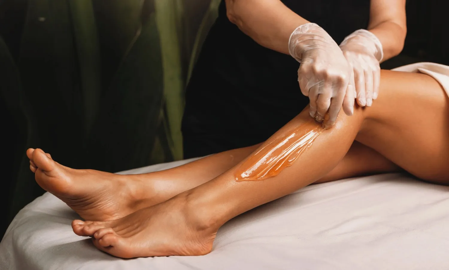 Woman Receiving Waxing Treatment in Grand Island and Hastings, NE
